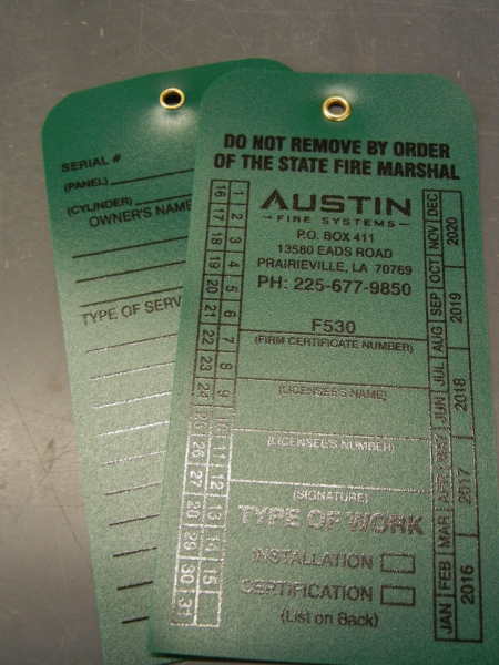 The most popular option for our durable plastic extinguisher tag is a metal eyelet.