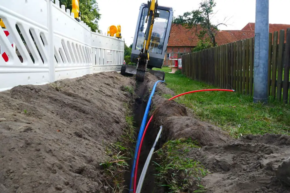 These safety stickers alert the presence of buried cables.