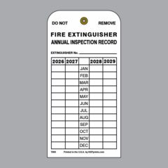 White plastic fire extinguisher annual inspection tag with month and year checkboxes for recording required maintenance.